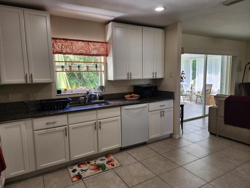 Private Preserve Views in Palm Grove! Enjoy the perfect blend of - photo 14