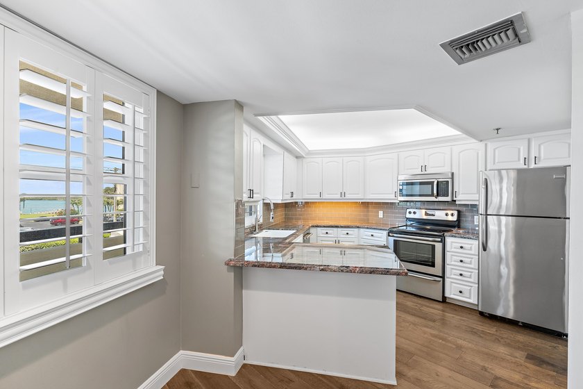 Wake up to breathtaking views of both the turquoise Intracoastal - photo 17