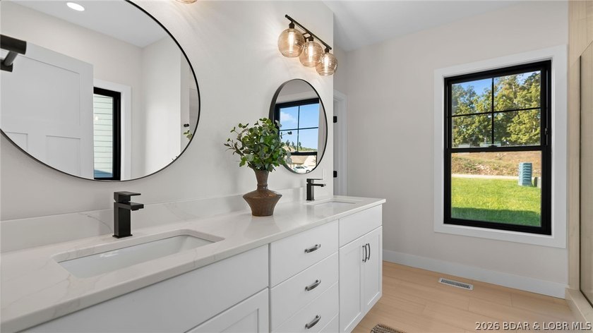 NEW CONSTRUCTION! Unobstructed lake views and luxury living - photo 22