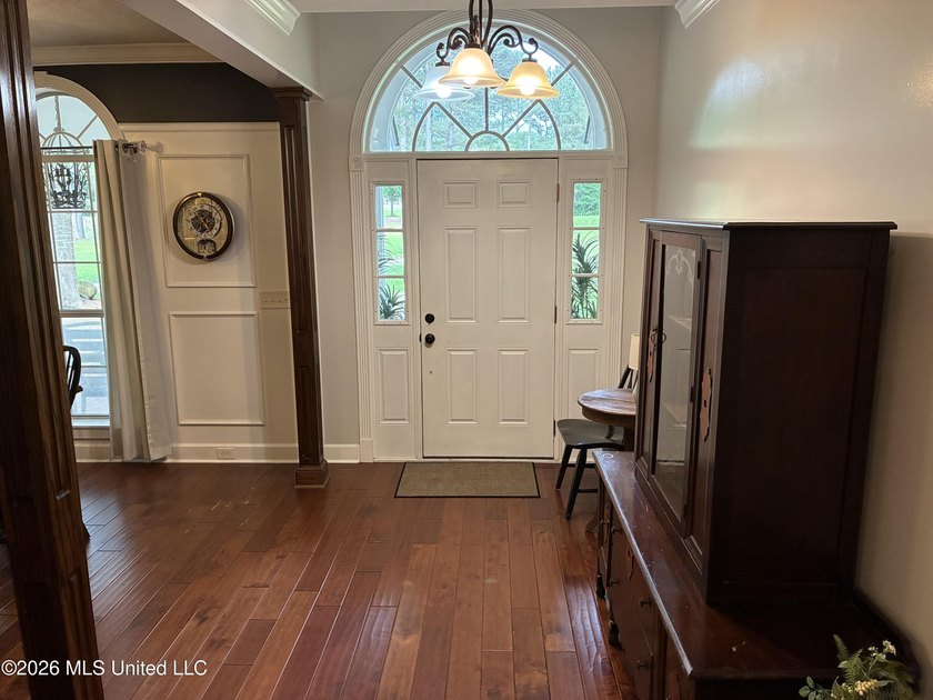 Nestled among towering pines with peaceful pond views, this - photo 5