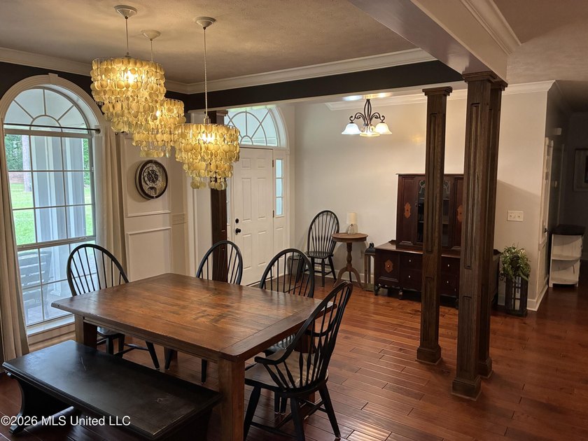 Nestled among towering pines with peaceful pond views, this - photo 7