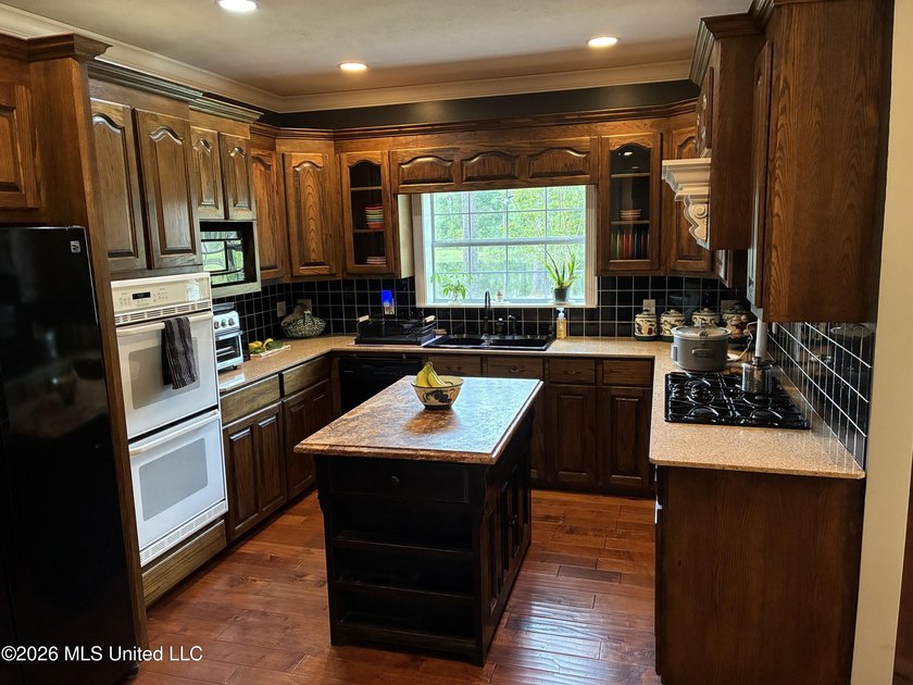 Nestled among towering pines with peaceful pond views, this - photo 8