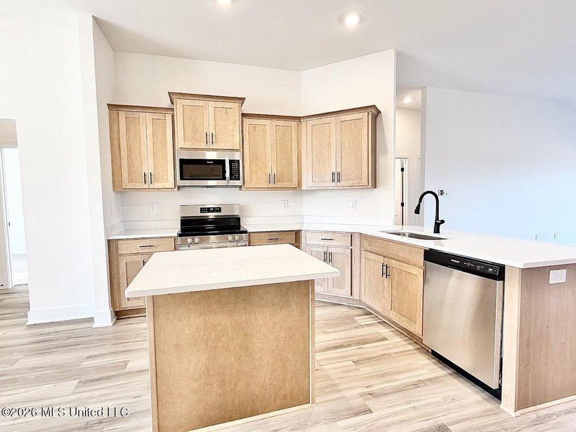 This beautifully designed 4 bedroom, 2 bath home blends modern - photo 6