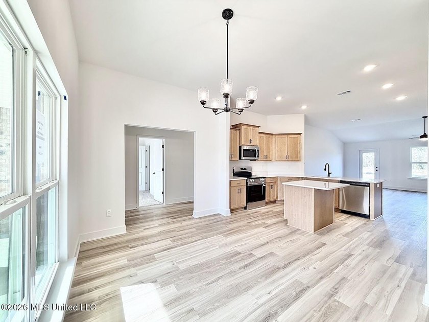 This beautifully designed 4 bedroom, 2 bath home blends modern - photo 9