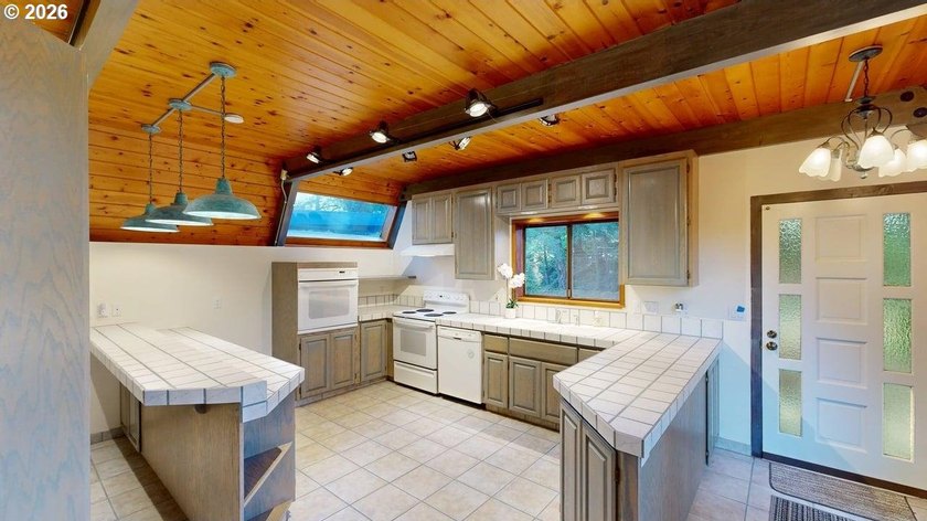 Tucked away on 4.98 private acres just minutes from downtown - photo 3