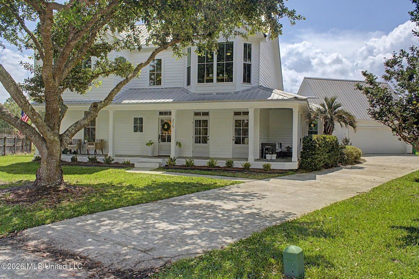 Experience the best of coastal living in this beautifully - photo 2