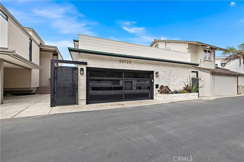 Experience the ultimate in beachfront living on one of Dana - photo 2