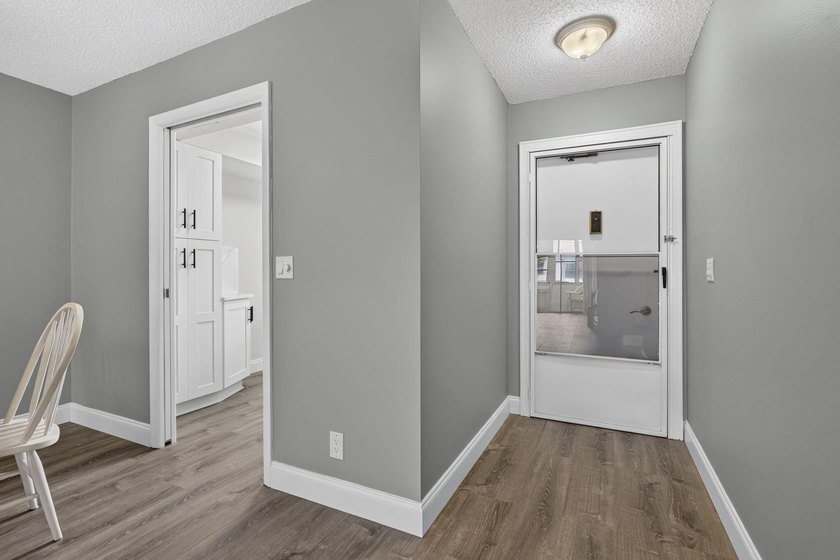Welcome to this beautifully remodeled 2-bed, 2-bath villa - photo 7