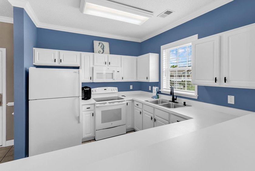 Top-floor 2-bedroom, 2-bath condo in The Havens at Barefoot - photo 15