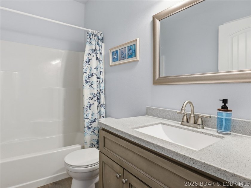 Lake living starts here! Nestled within the gated community of - photo 17