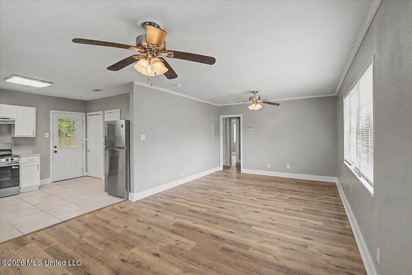 This beautifully updated 3 bedroom, 1 bathroom home offers a - photo 2