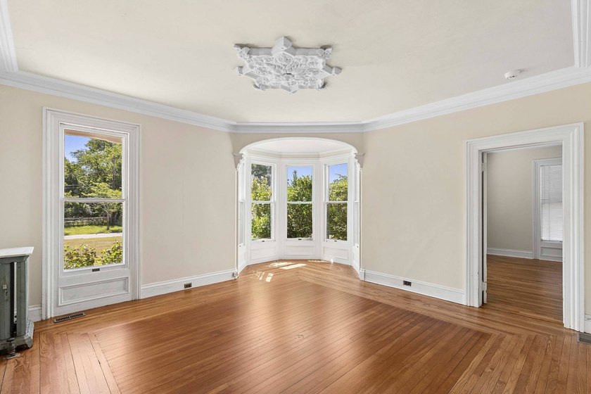 The roughly 4,400 +/- SF home sits on 2.84 acres - built in 1867 - photo 3