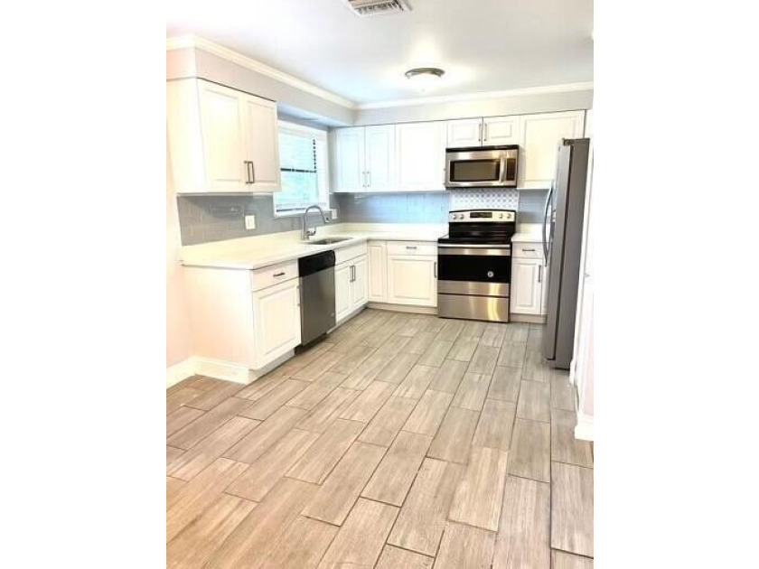 Rare opportunity to own a versatile investment property in the - photo 5