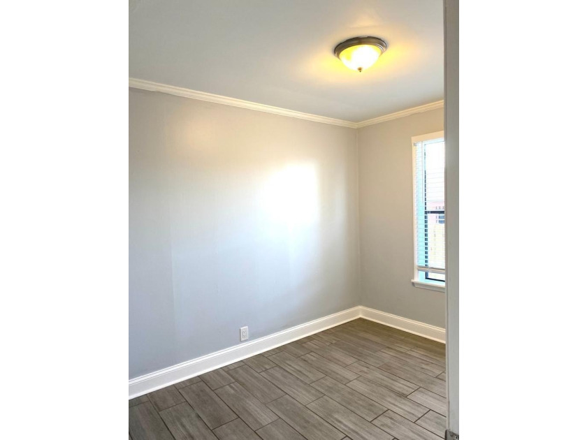 Rare opportunity to own a versatile investment property in the - photo 9
