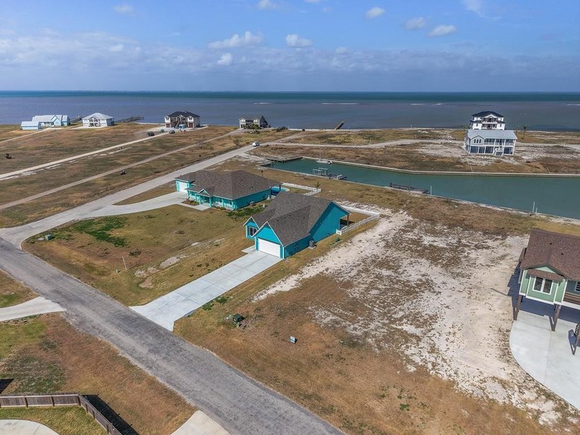 Custom built in 2024, 1515 Cape Velero offers refined waterfront - photo 2