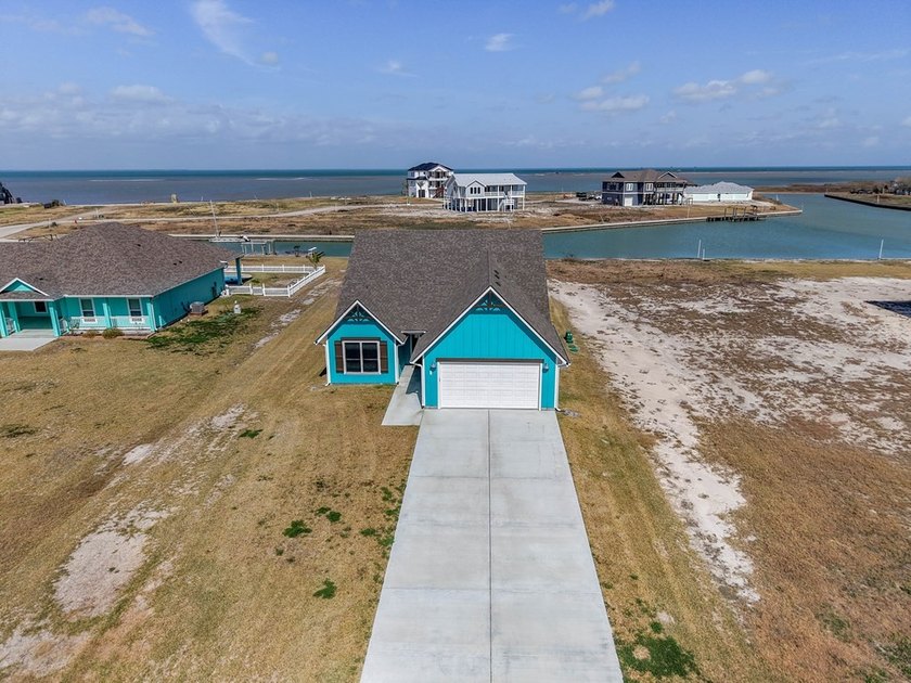 Custom built in 2024, 1515 Cape Velero offers refined waterfront - photo 3