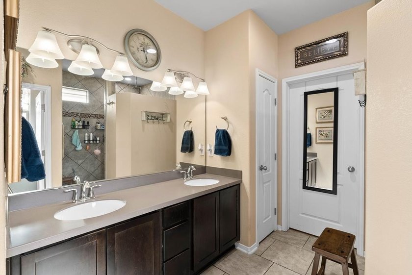 This stunning cul-de-sac 3/2/2 home has it all! Roll down storm - photo 9