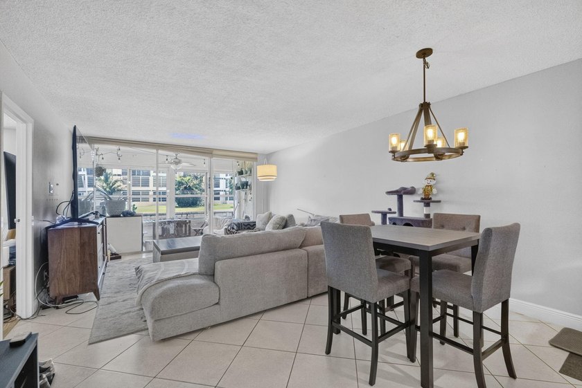 Welcome to this FIRST FLOOR, 2-bedroom, 2-bathroom condominium - photo 2