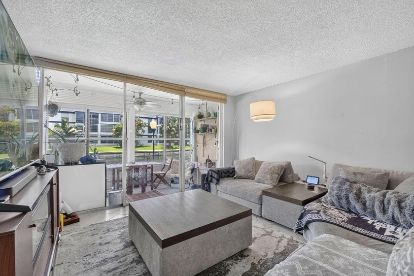 Welcome to this FIRST FLOOR, 2-bedroom, 2-bathroom condominium - photo 3