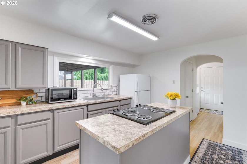 Turnkey and move-in ready, this beautifully updated 3 bedroom, 1 - photo 7