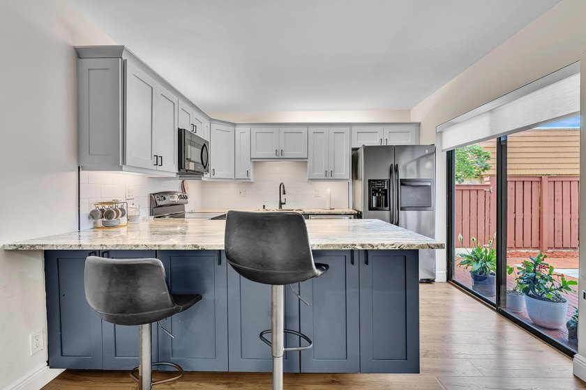 This spacious, light-filled residence features a beautifully - photo 10