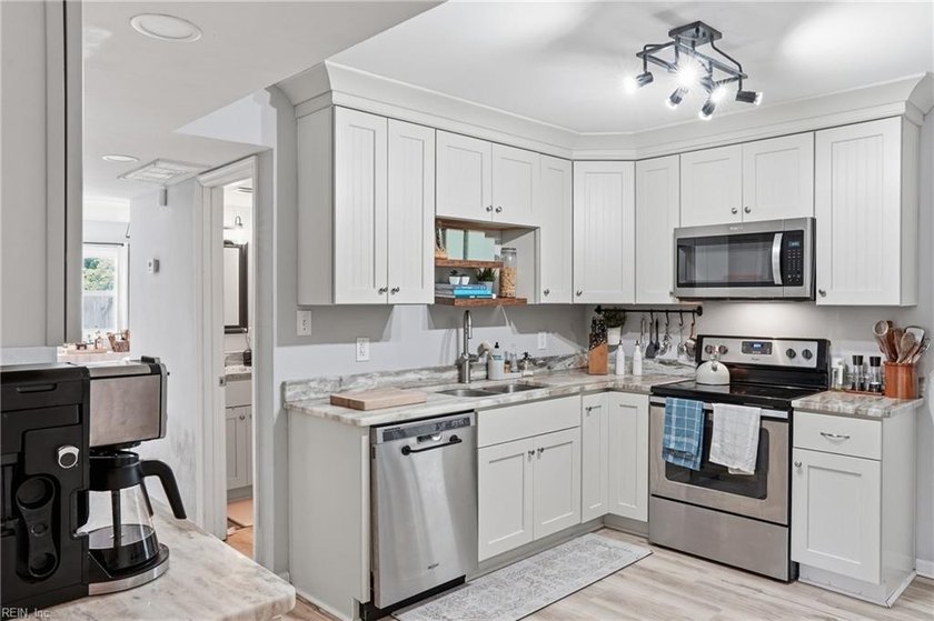 Tucked away on a quiet cul-de-sac, 6 Maume Circle offers the - photo 11