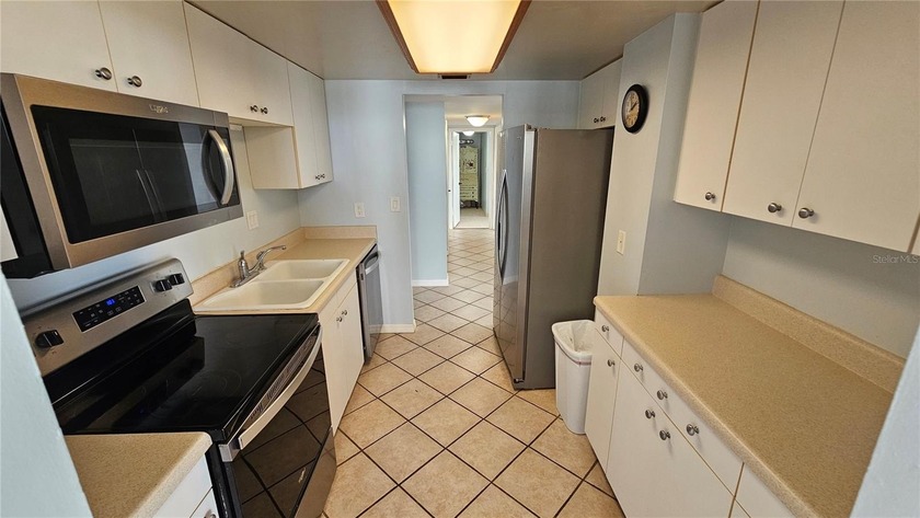 2BR/2BA Condo with Wrap-Around Balcony - Daytona Beach - photo 13