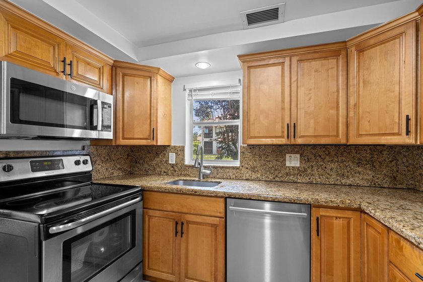 ABSOLUTELY GORGEOUS FIRST FLOOR CONDO | PRESTIGIOUS BANYAN - photo 10