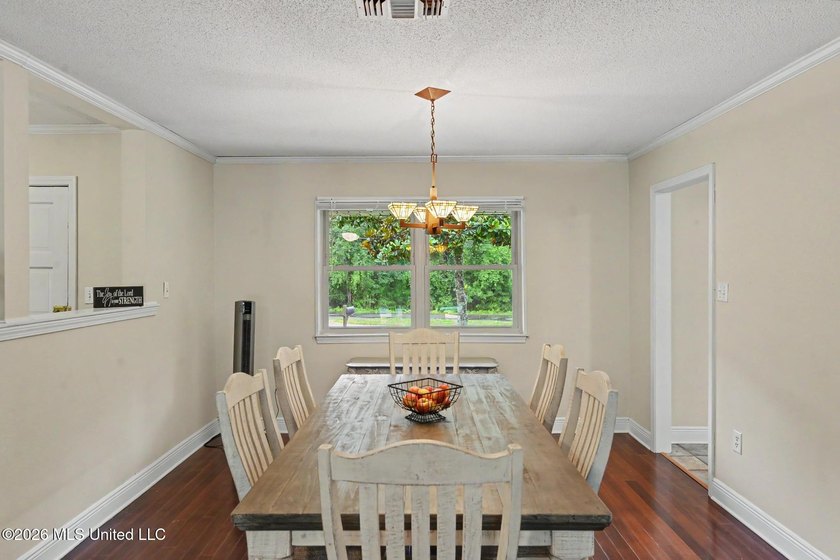 Situated on a quiet cul-de-sac in the heart of Diamondhead, this - photo 6