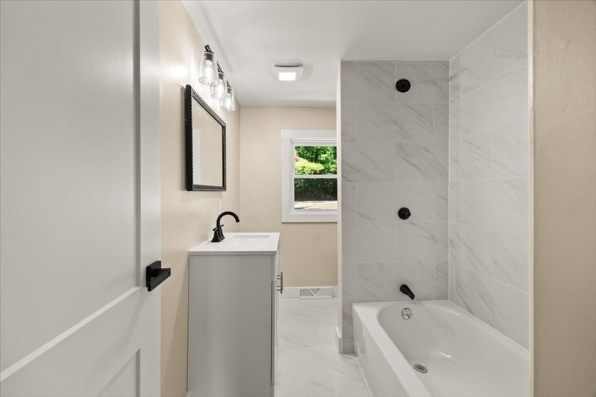 Fully renovated and move-in ready, this charming 2-bedroom home - photo 16