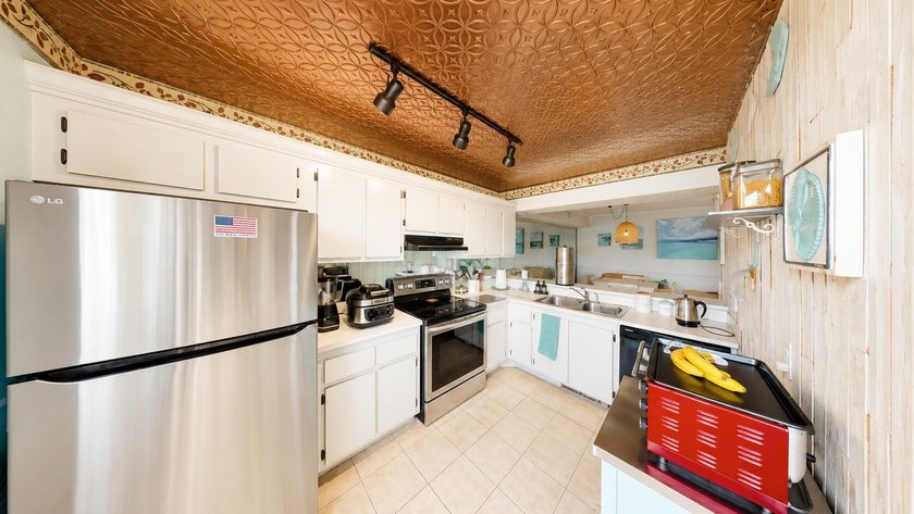 Waterfront living awaits in this beautifully maintained - photo 6