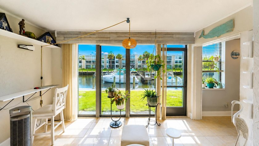 Waterfront living awaits in this beautifully maintained - photo 8