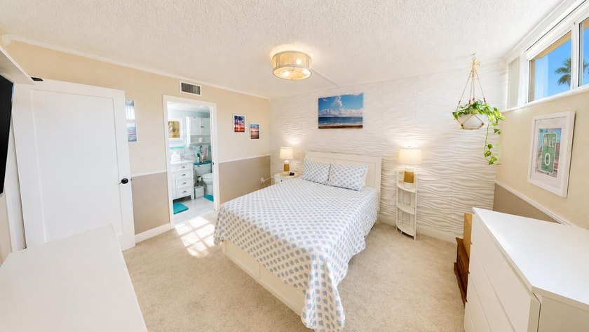 Waterfront living awaits in this beautifully maintained - photo 10
