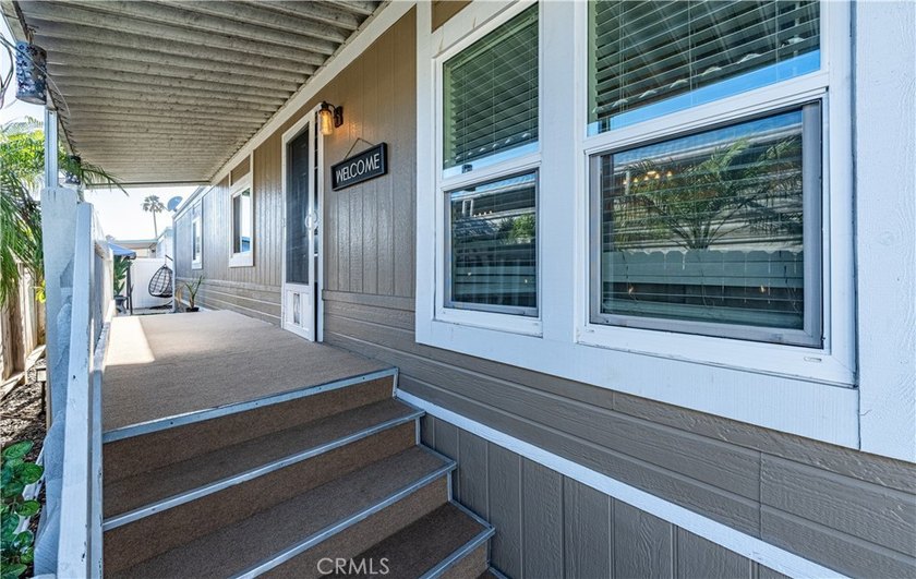 Boasting a rare, extra-large yard with a great grass area, this - photo 3
