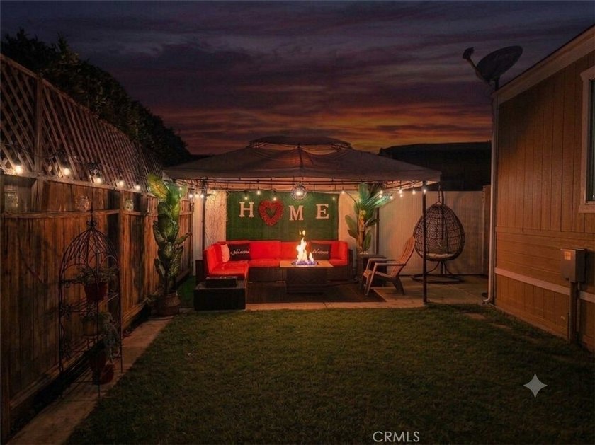 Boasting a rare, extra-large yard with a great grass area, this - photo 7