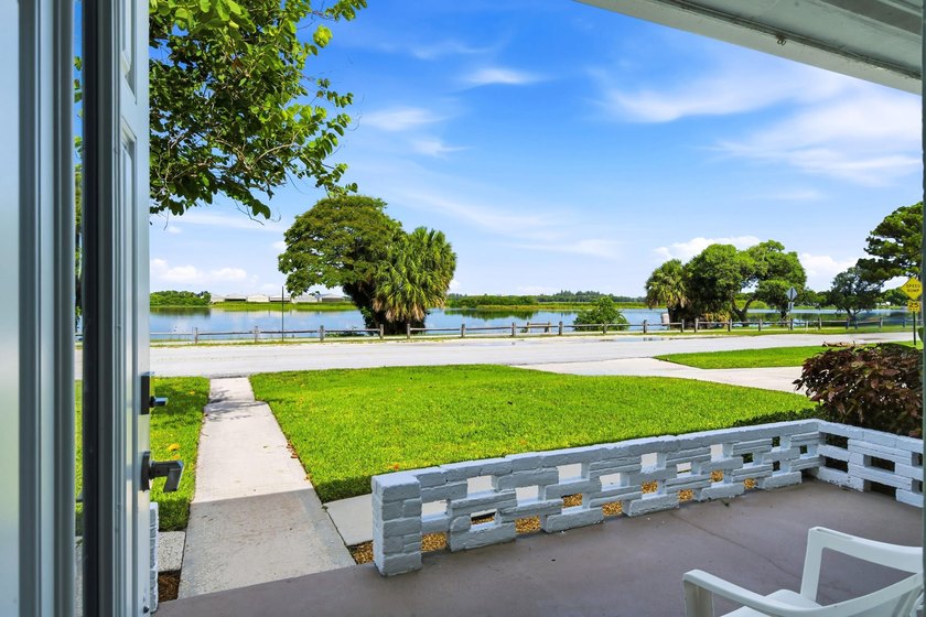 Lakefront living at its finest! Enjoy breathtaking panoramic - photo 5