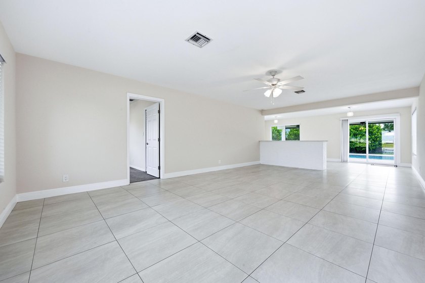 Lakefront living at its finest! Enjoy breathtaking panoramic - photo 6