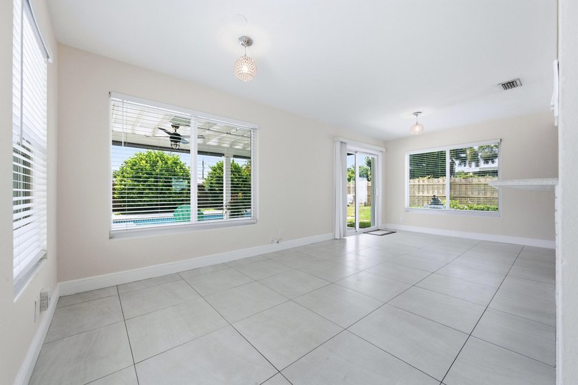 Lakefront living at its finest! Enjoy breathtaking panoramic - photo 9