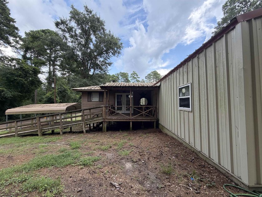 Escape to peaceful East Texas living in this charming 3-bedroom - photo 17