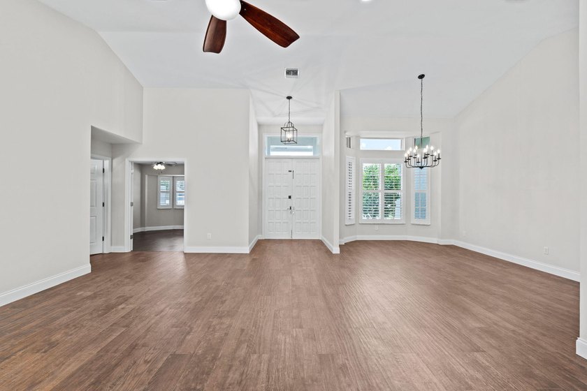Welcome to this spacious single-story pool home in the - photo 8