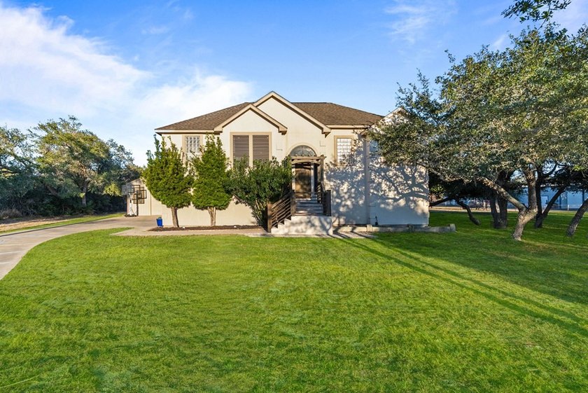A home that truly meets every need and desire. Situated on - photo 3