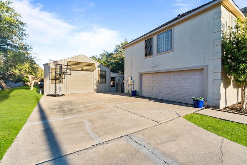 A home that truly meets every need and desire. Situated on - photo 4
