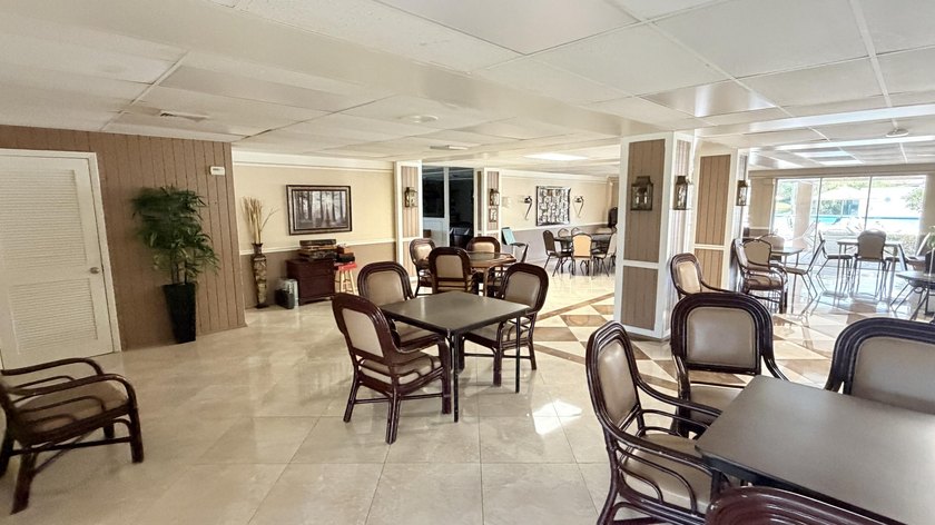 Wellmaintained 2ndfloor corner unit with a bright convertible - photo 16