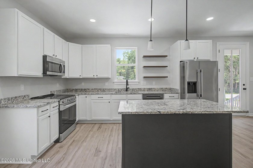 You'll feel right at home in this beautiful new construction - photo 4