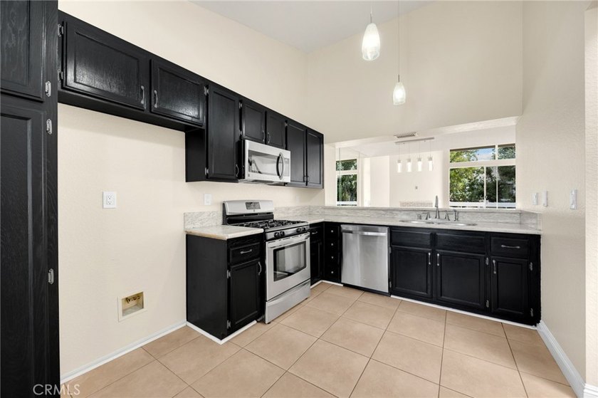 This spacious two-primary-suite condo offers exceptional - photo 7