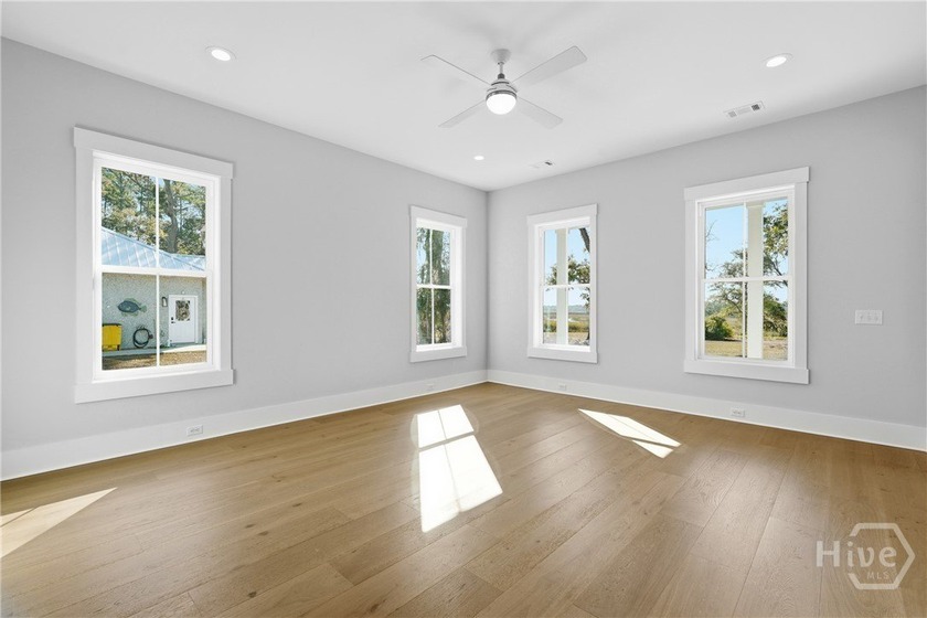 Luxurious marsh-front, newly constructed custom home on .78 - photo 20