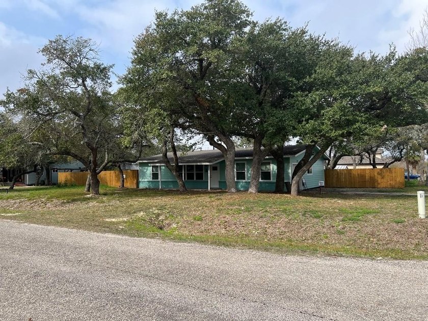 This beautifully updated 3-bedroom, 2-bath home features a - photo 2