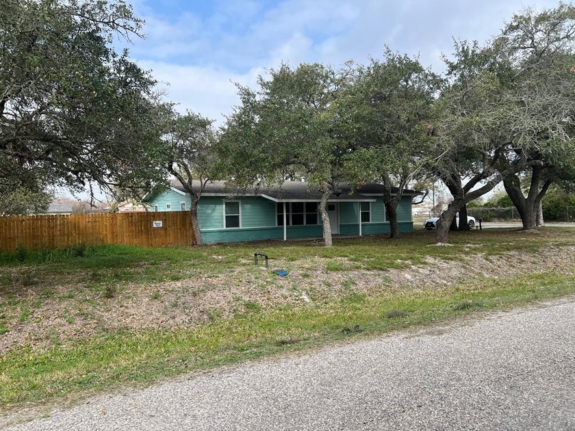 This beautifully updated 3-bedroom, 2-bath home features a - photo 3