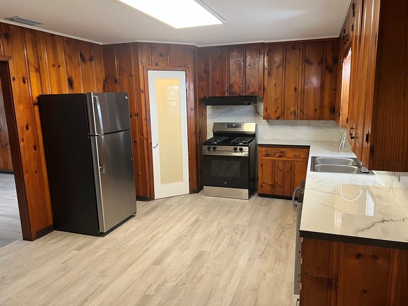 This beautifully updated 3-bedroom, 2-bath home features a - photo 8