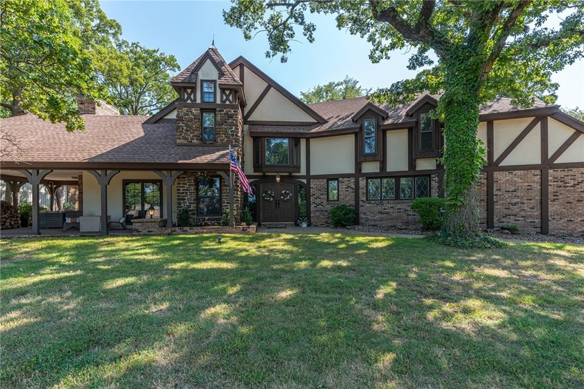 Welcome to this charming Tudor-style home in the Fianna Hills - photo 34
